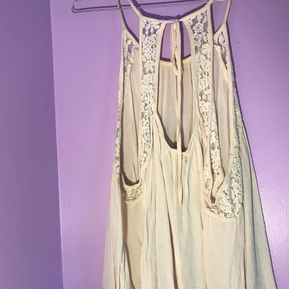 Beige strappy/flowy tank